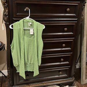 Sleeveless green top with tie neck